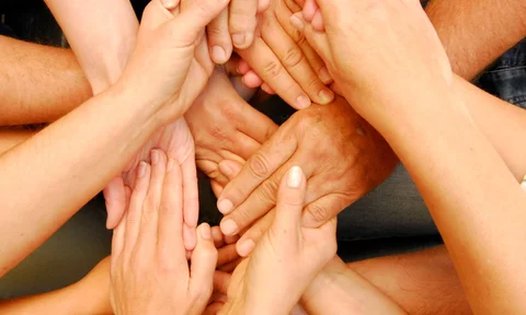 Holding hands with each other | The meaning of non-profit organizations for society | Anosk